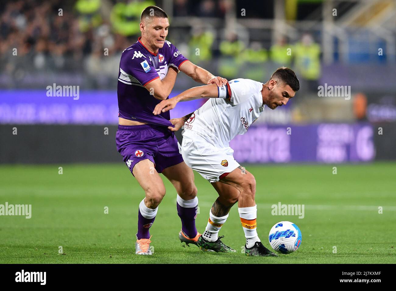 Florence, Italy. 21st May, 2022. Moise Kean of Juventus FC and Nikola  Milenkovic of ACF Fiorentina compete for the ball during the Serie A  2021/2022 football match between ACF Fiorentina and Juventus