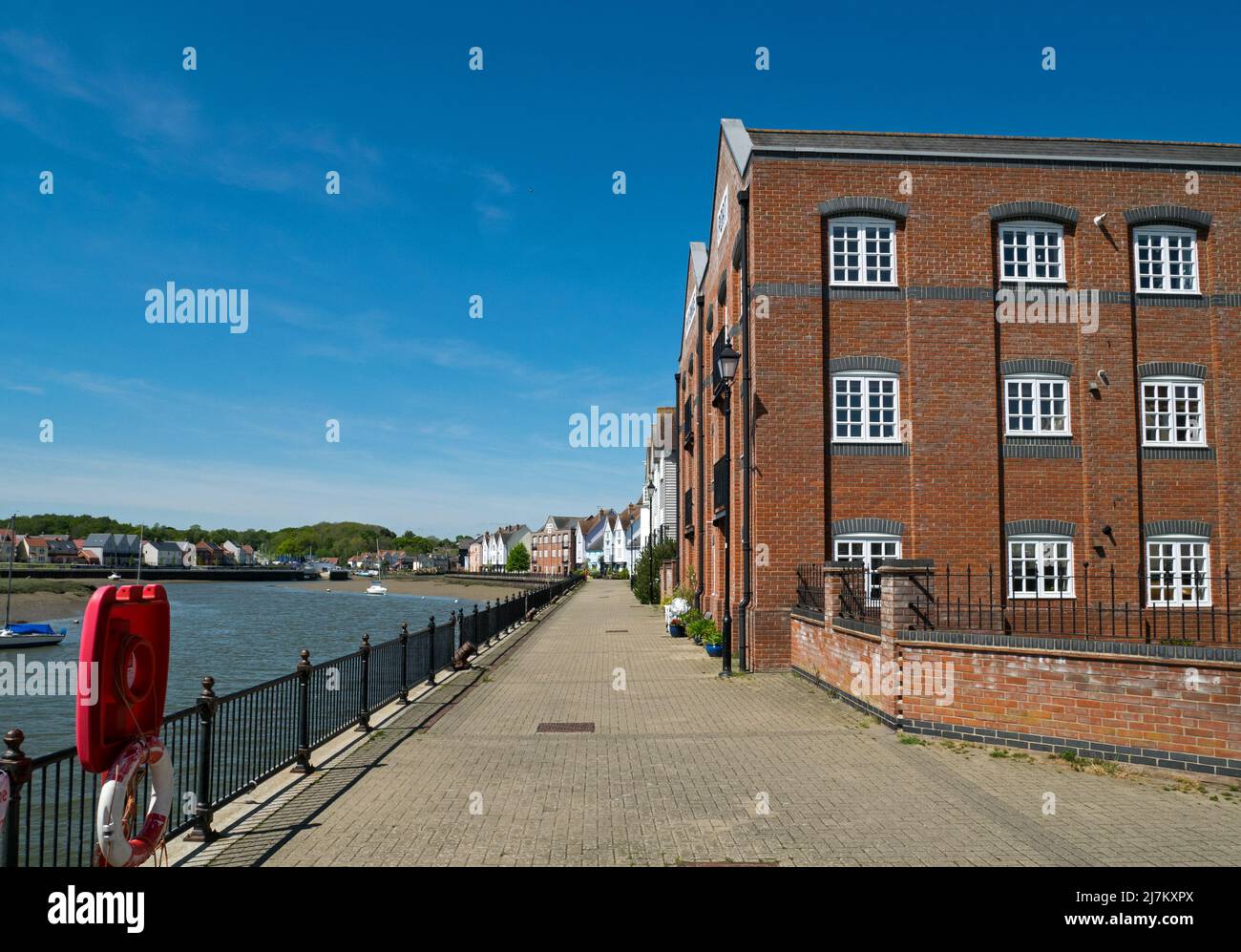 Former warehouses alongside the River Colne now converted to residential, Wivenhoe, Essex, England, UK, Stock Photo