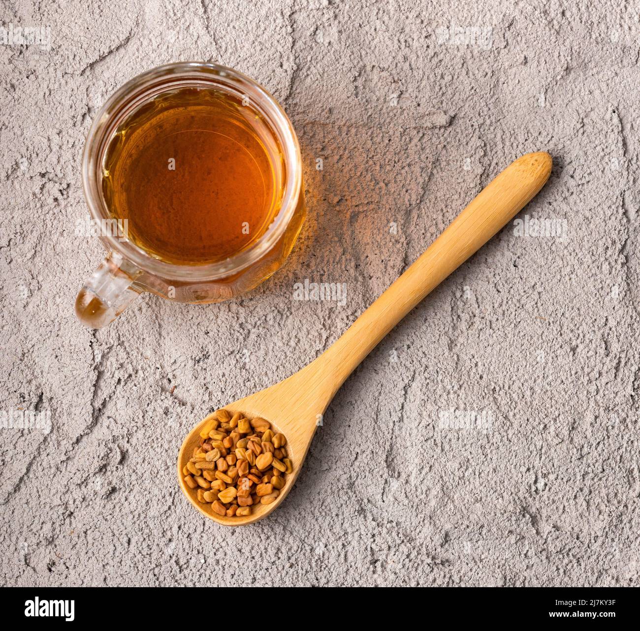 Fenugreek Tea Cup Trigonella foenumgraecum. Healthy food Stock Photo