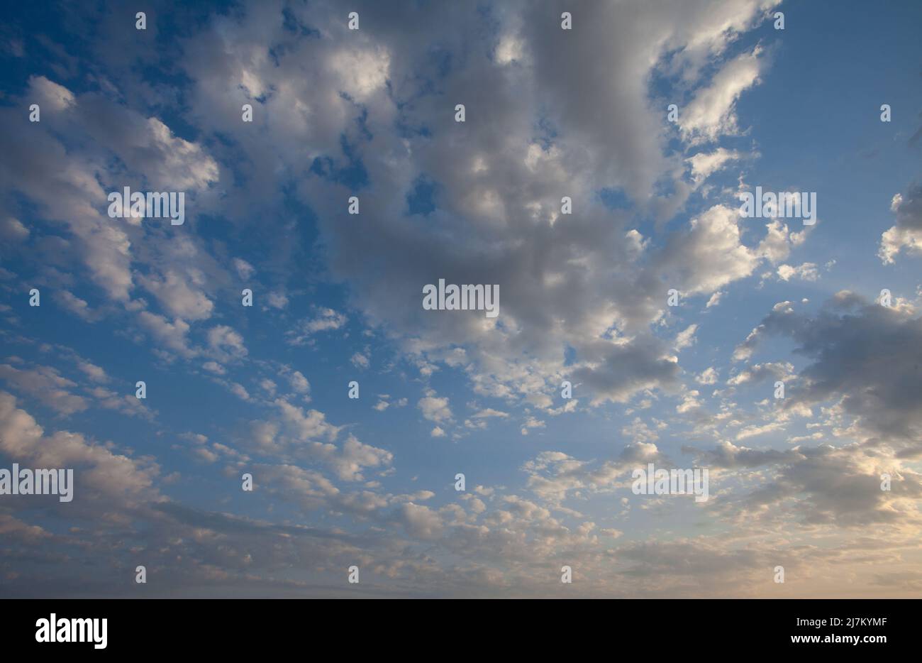 Fantastic soft white clouds against blue sky background Stock Photo