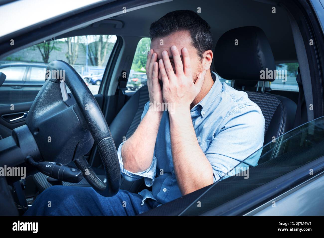 One sad guilty driver feeling bad after car crash Stock Photo Alamy