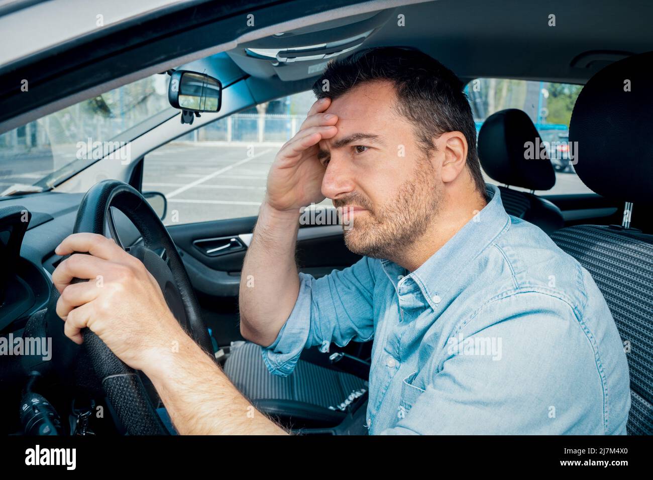 One sad guilty driver feeling bad after car crash Stock Photo Alamy