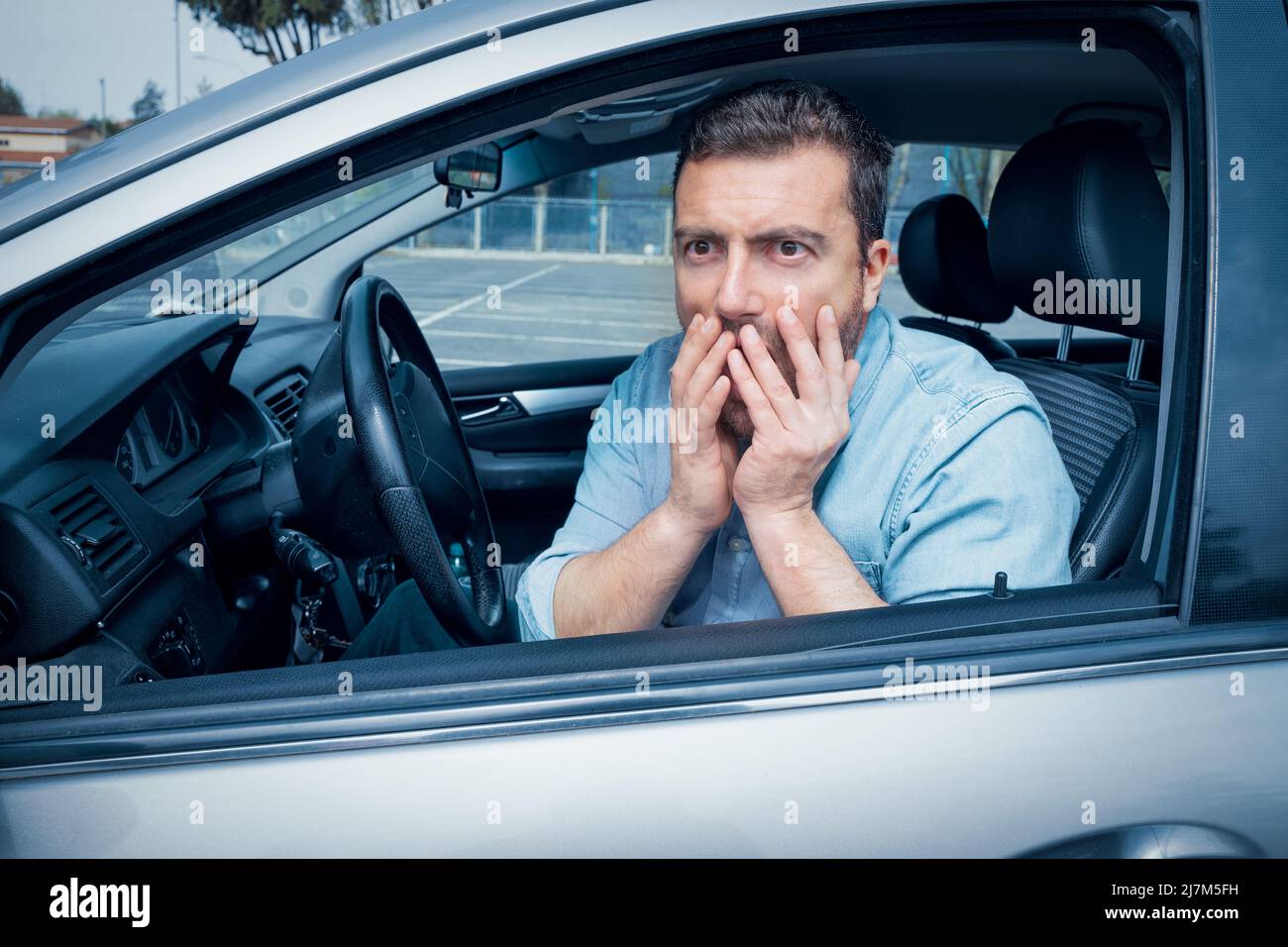 One sad guilty driver feeling bad after car crash Stock Photo Alamy