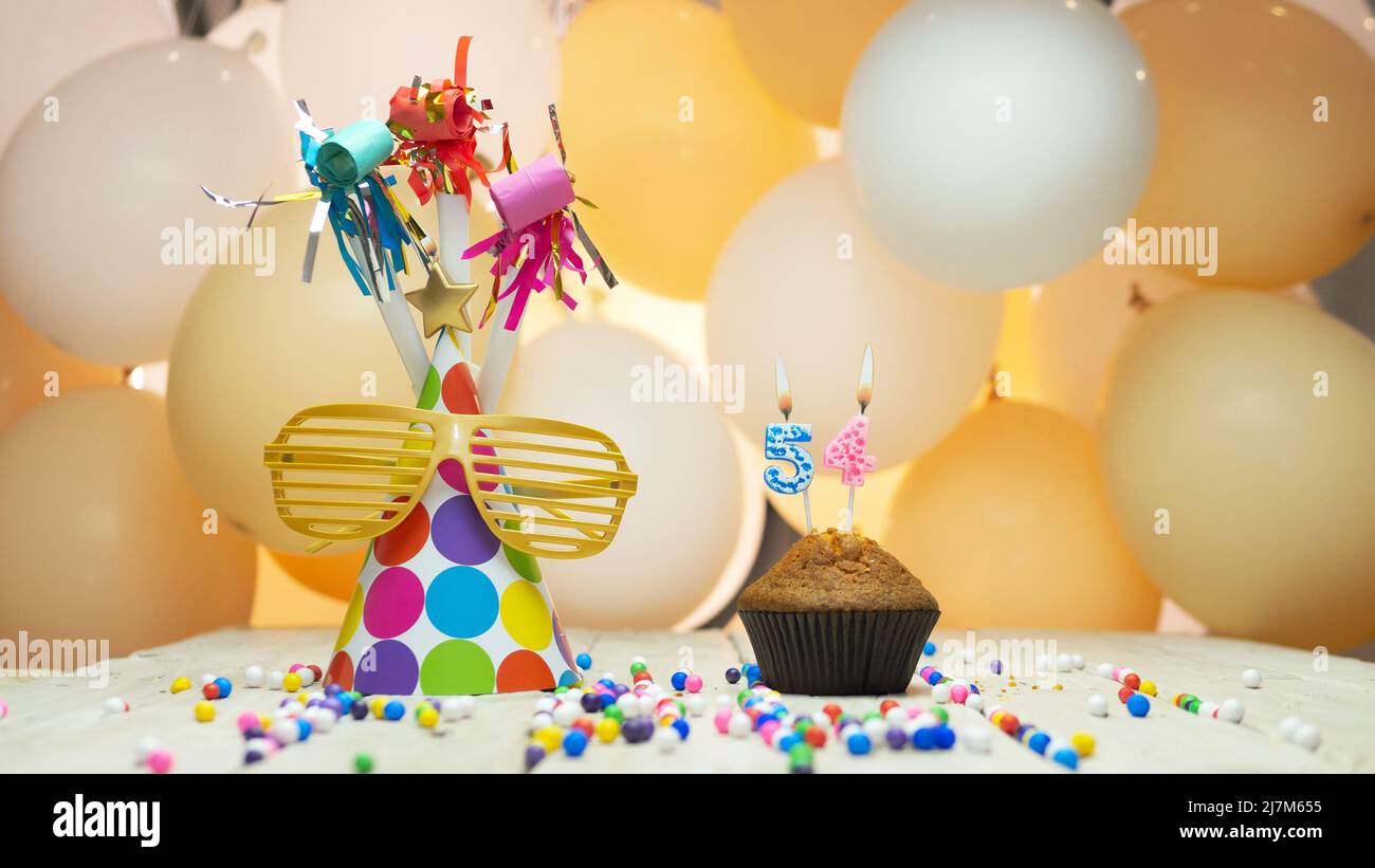 Creative happy birthday greetings with number or number, holiday background with balloons, decorations for the holiday, copy space. Stock Photo