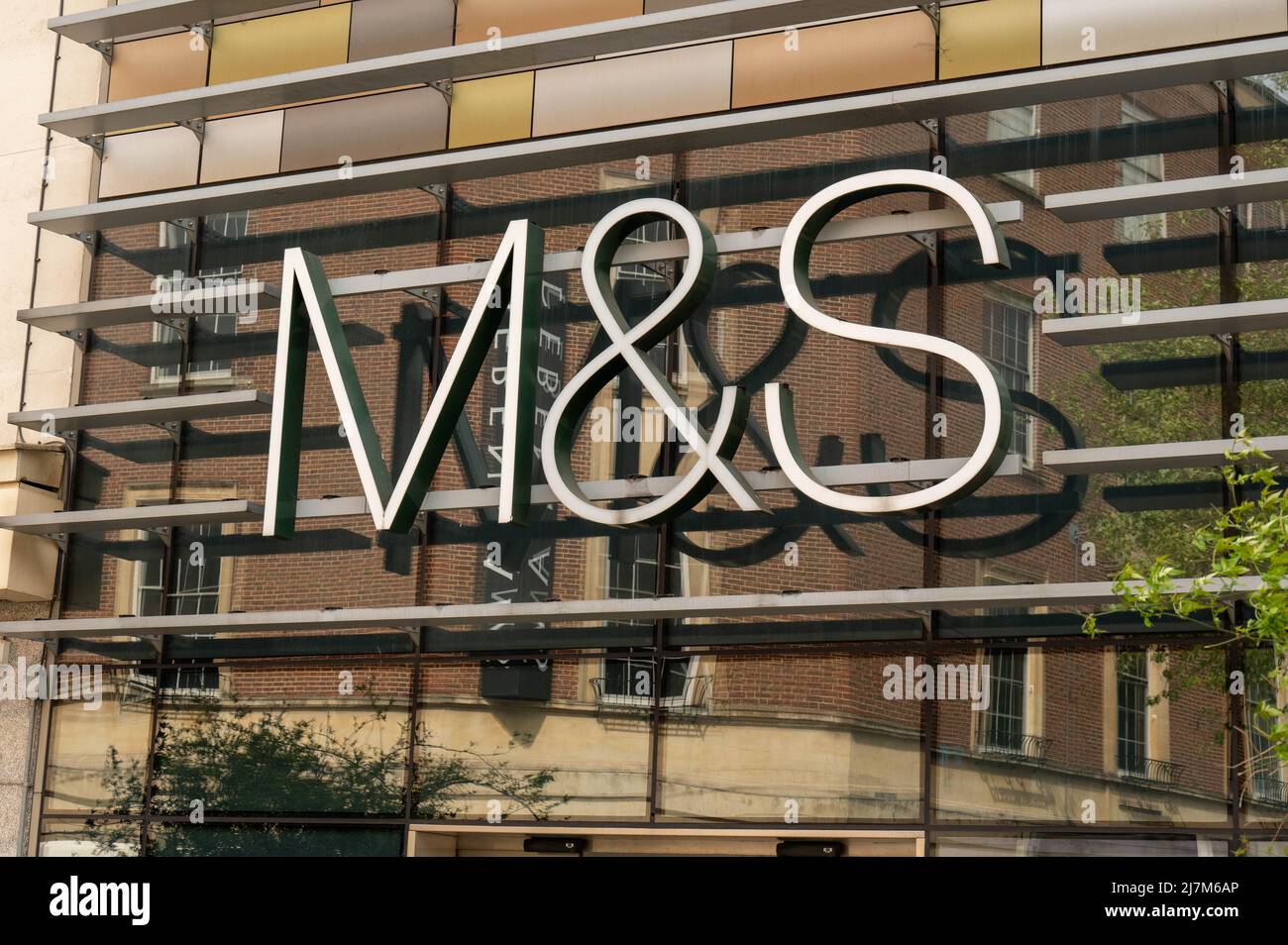 Branch of Marks and Spencers (M&S) logo in United Kingdom / M&S logo marks and spencers sign Stock Photo