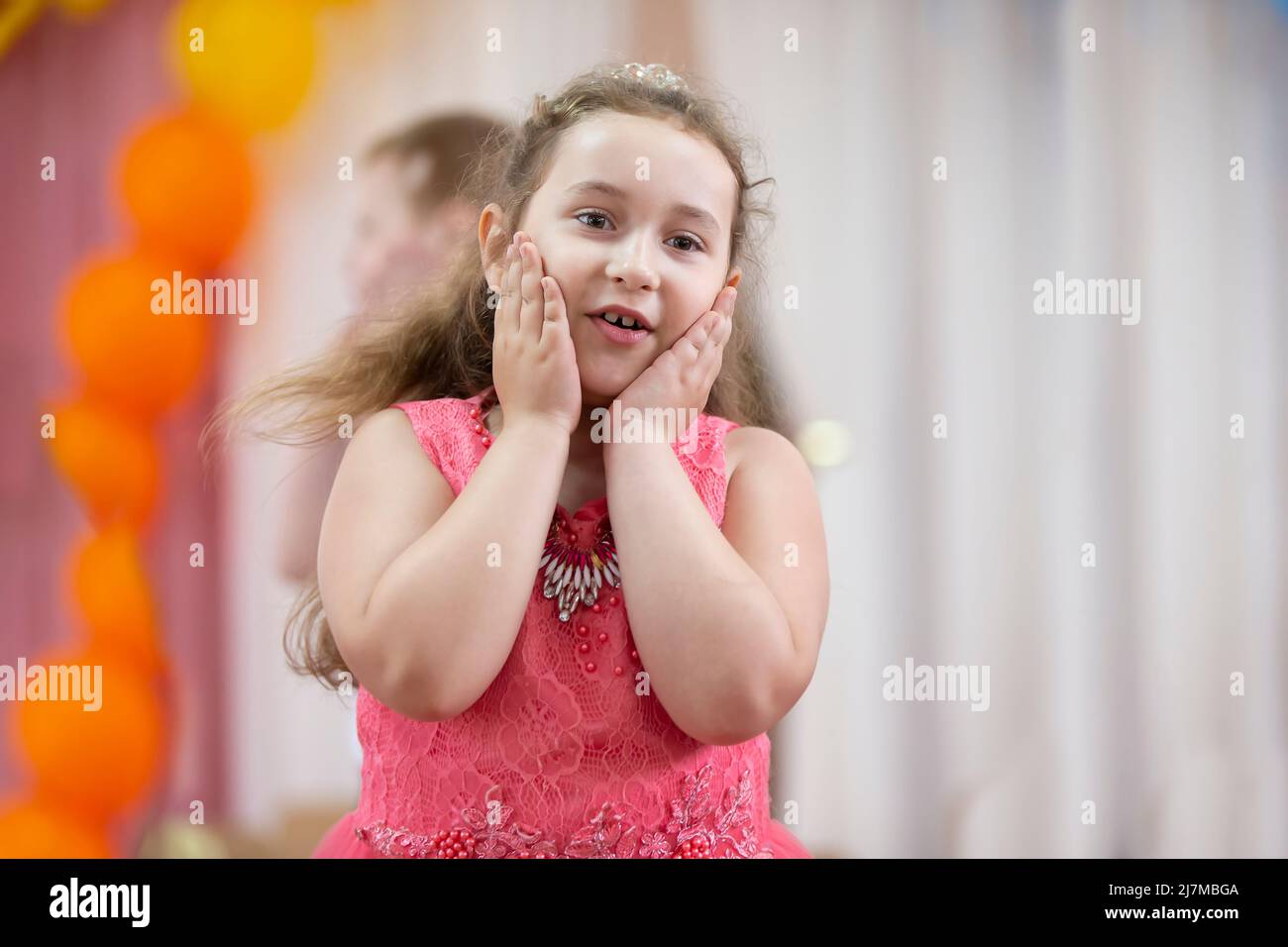 A little girl dances on a holiday Stock Photo Alamy