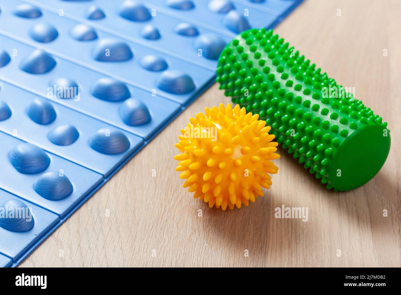 massage rubber balls, mat and roller for self massage and reflexology Stock Photo