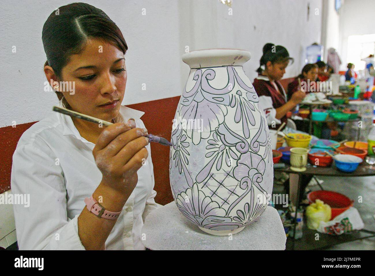 Mexico, Zacatecas - women are painting ceramic vases for mainly the touristic sector. Stock Photo