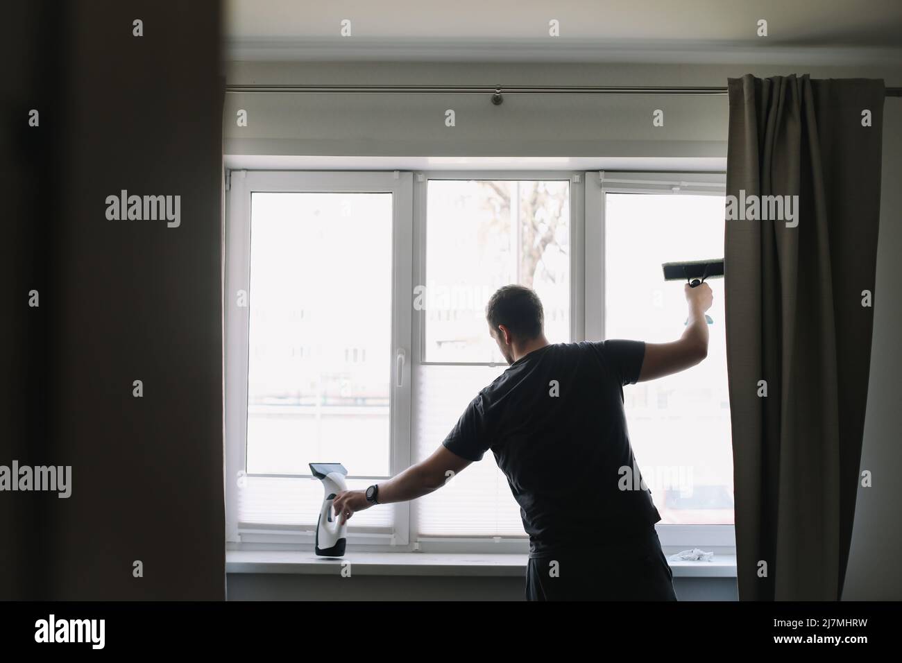 washing and cleaning window at home. Housework and housekeeping, home