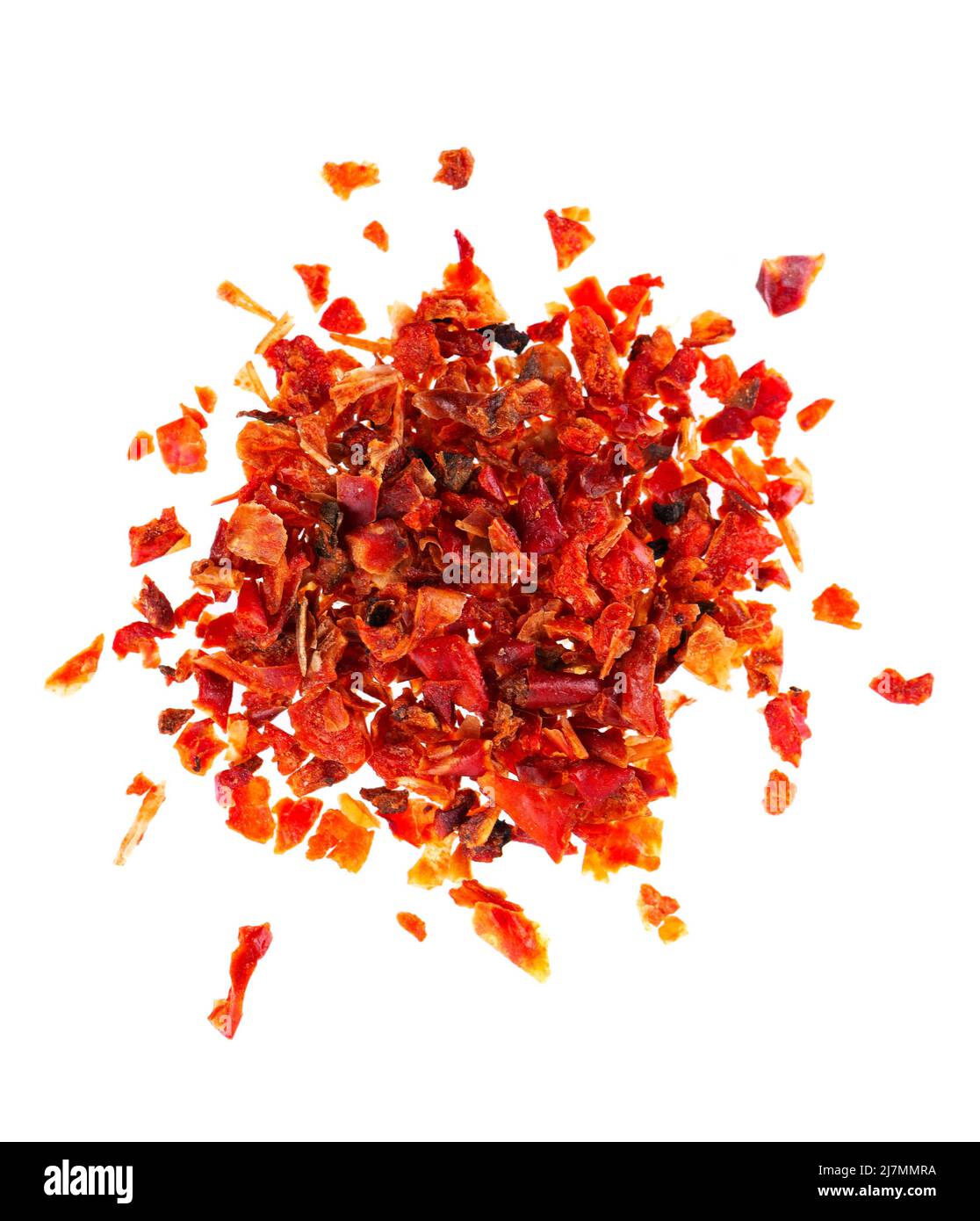 Dried red paprika flakes isolated on white background. Spices and herbs