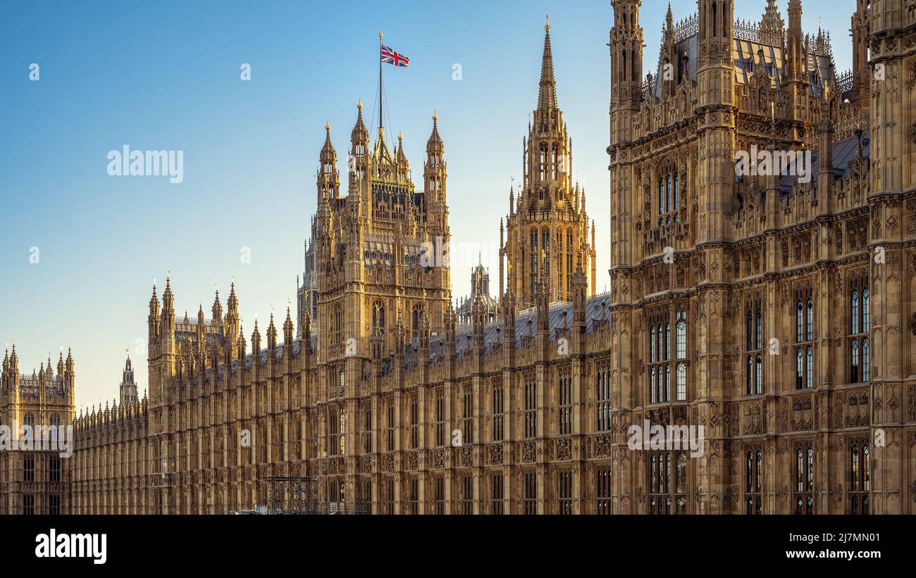 the facade of the palace of westminster during sunset, london Stock Photo