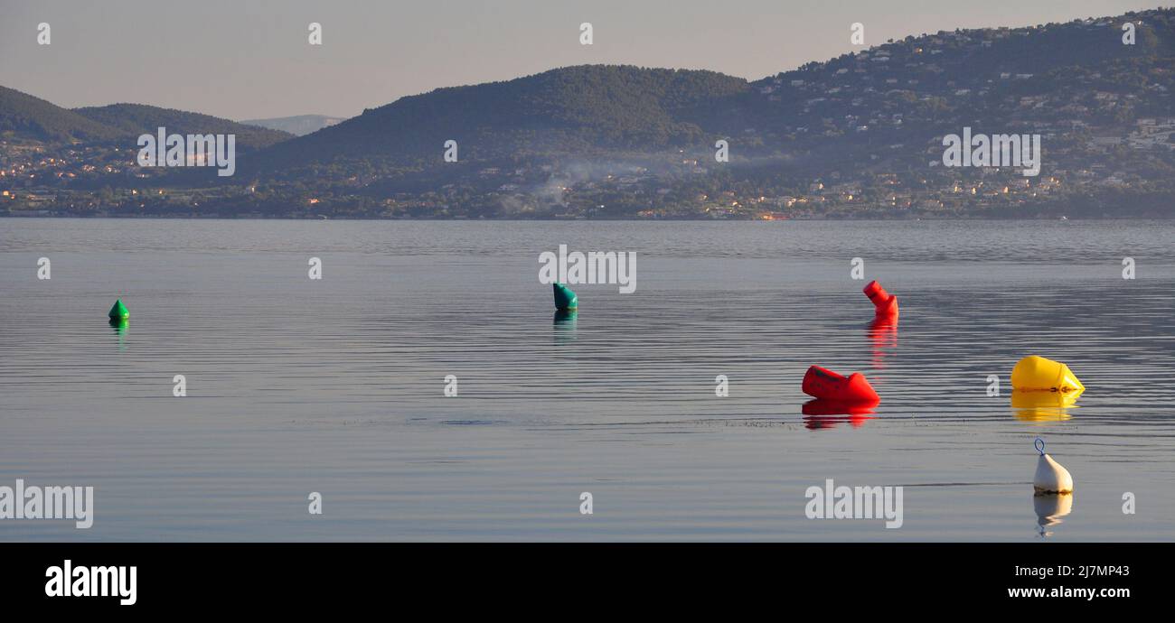 Colored buoys at the port of La Madrague Presqu'ile de Giens Stock Photo