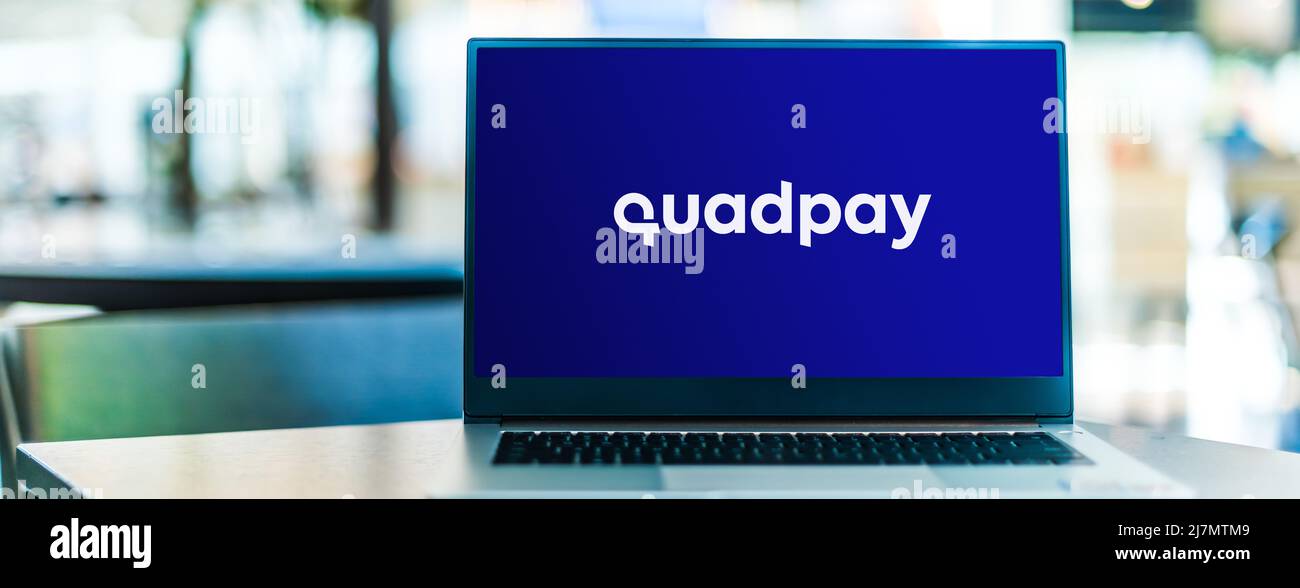 POZNAN, POL OCT 22, 2021 Laptop computer displaying logo of Quadpay