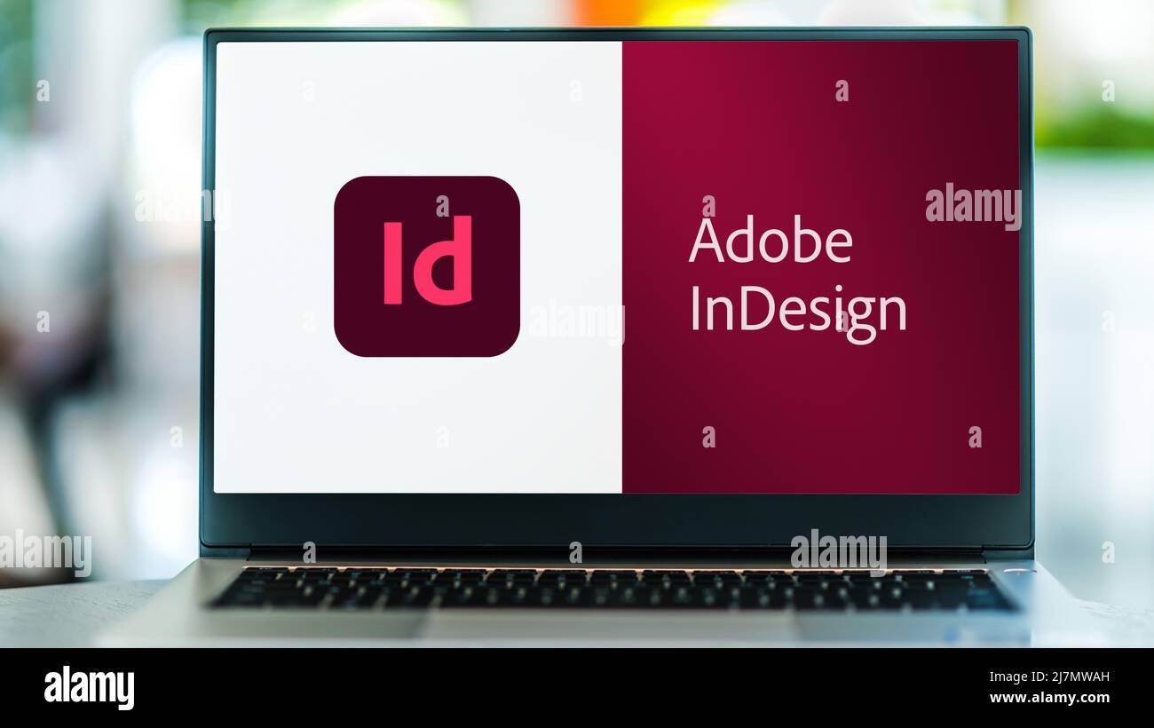 Old Computer Log Indesign POZNAN, POL - SEP 22, 2021: Laptop computer displaying logo of Adobe ...