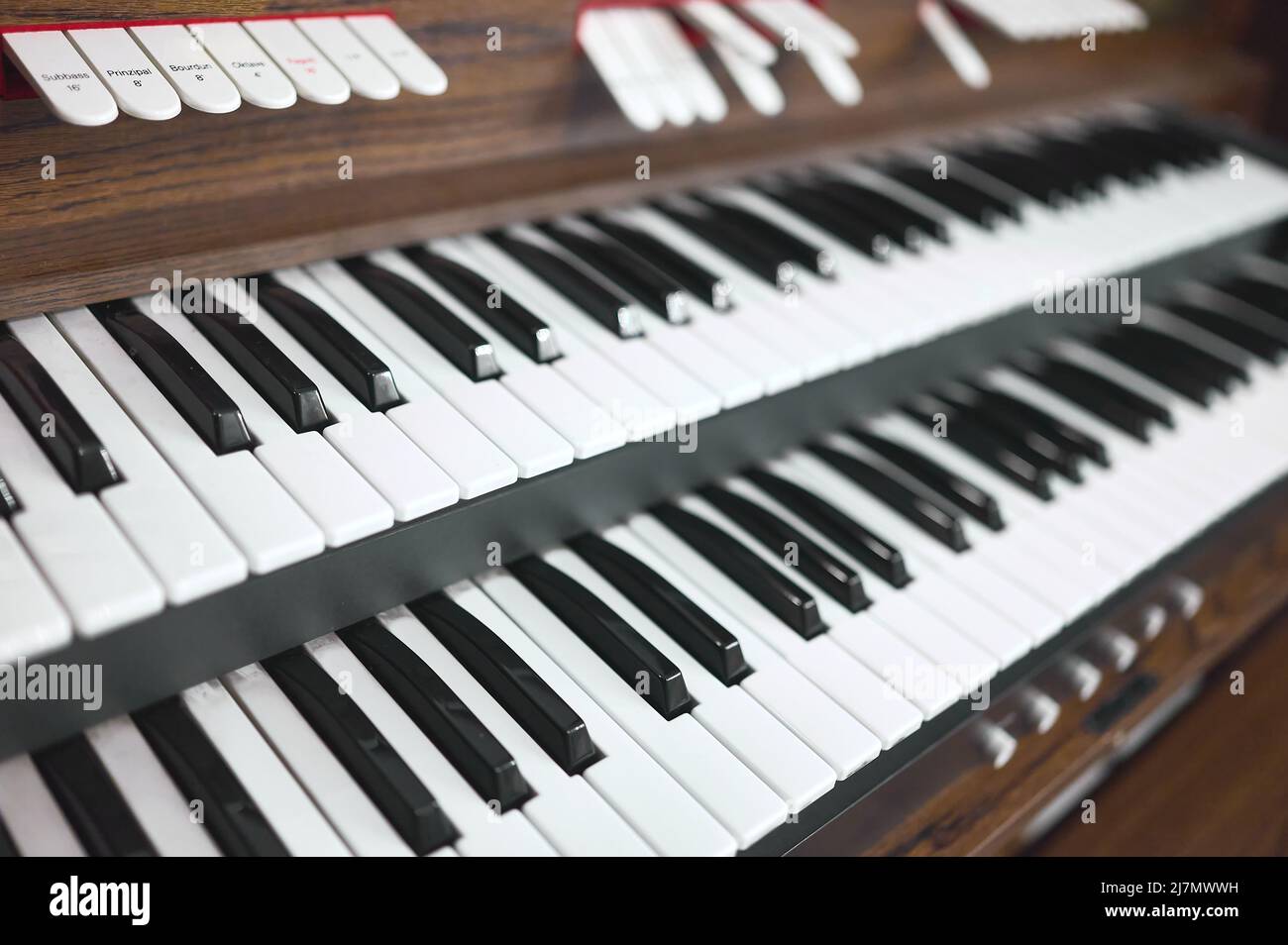 detailf of a keyboards, console, pedals of an organ in a church Stock Photo