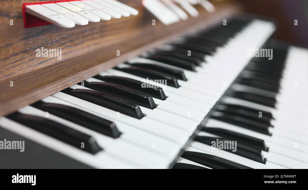 detail of a keyboards, console, pedals of an organ in a church Stock Photo