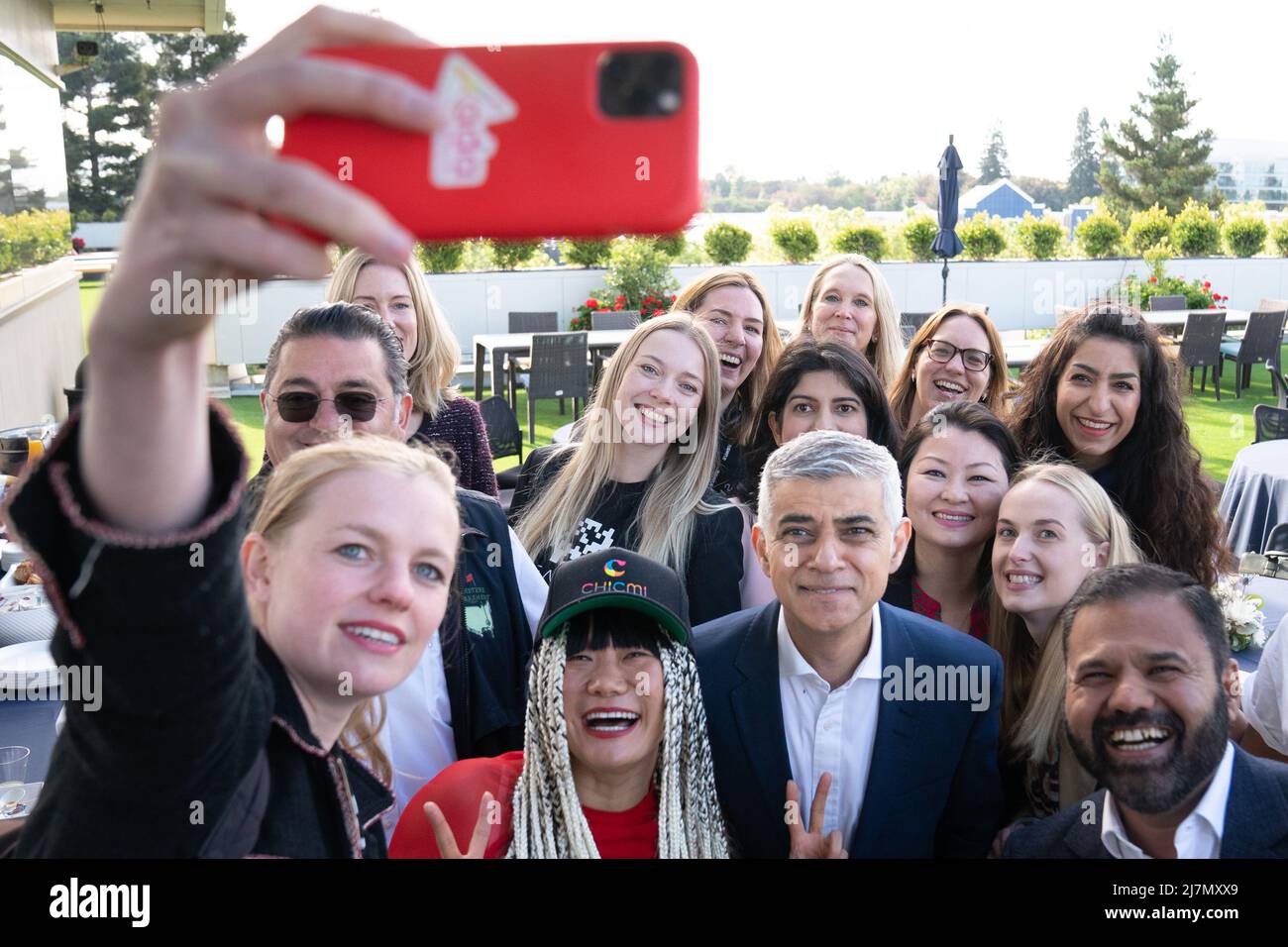 Mayor of London Sadiq Khan poses for a selfie photograph with Female Founders of London & Partners’ trade mission at Plug & Play in Silicon Valley in California. Plug & Play is a global corporate innovation platform connecting start-ups, corporations & venture capital firms. The mayor is on a 5 day visit to the US in a bid to boost London's tourism industry. Picture date: Tuesday May 10, 2022. Stock Photo