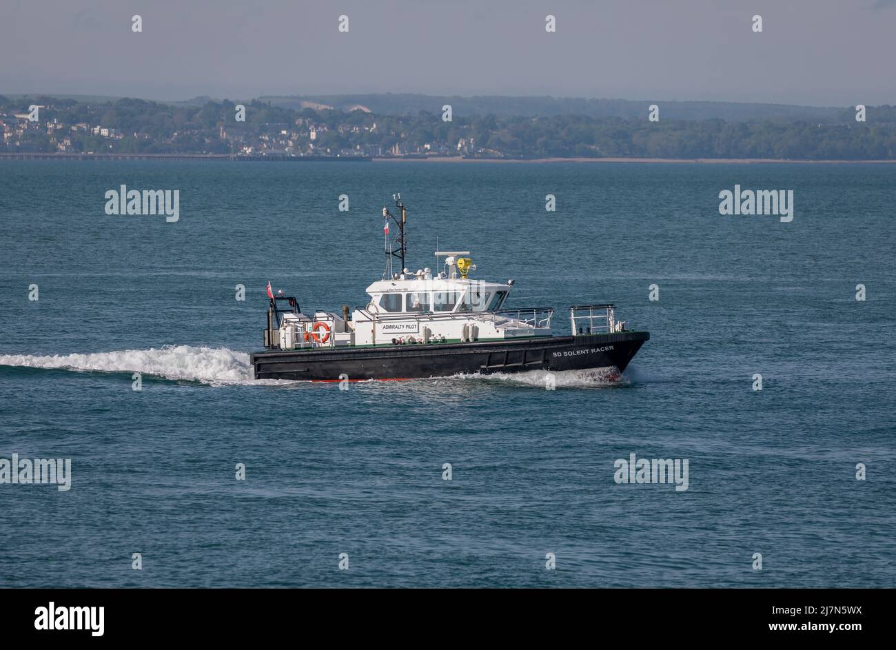 Admiralty Pilot vessel SD Solent Racer crossing the Solent towards Portsmouth harbour. Stock Photo