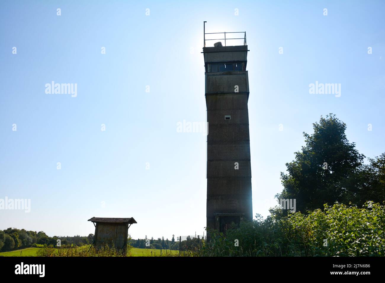 An old border watchtower of a former GDR border fortification, at the border triangle of Hesse, Thuringia and Bavaria, not far from the Black Moor in Stock Photo