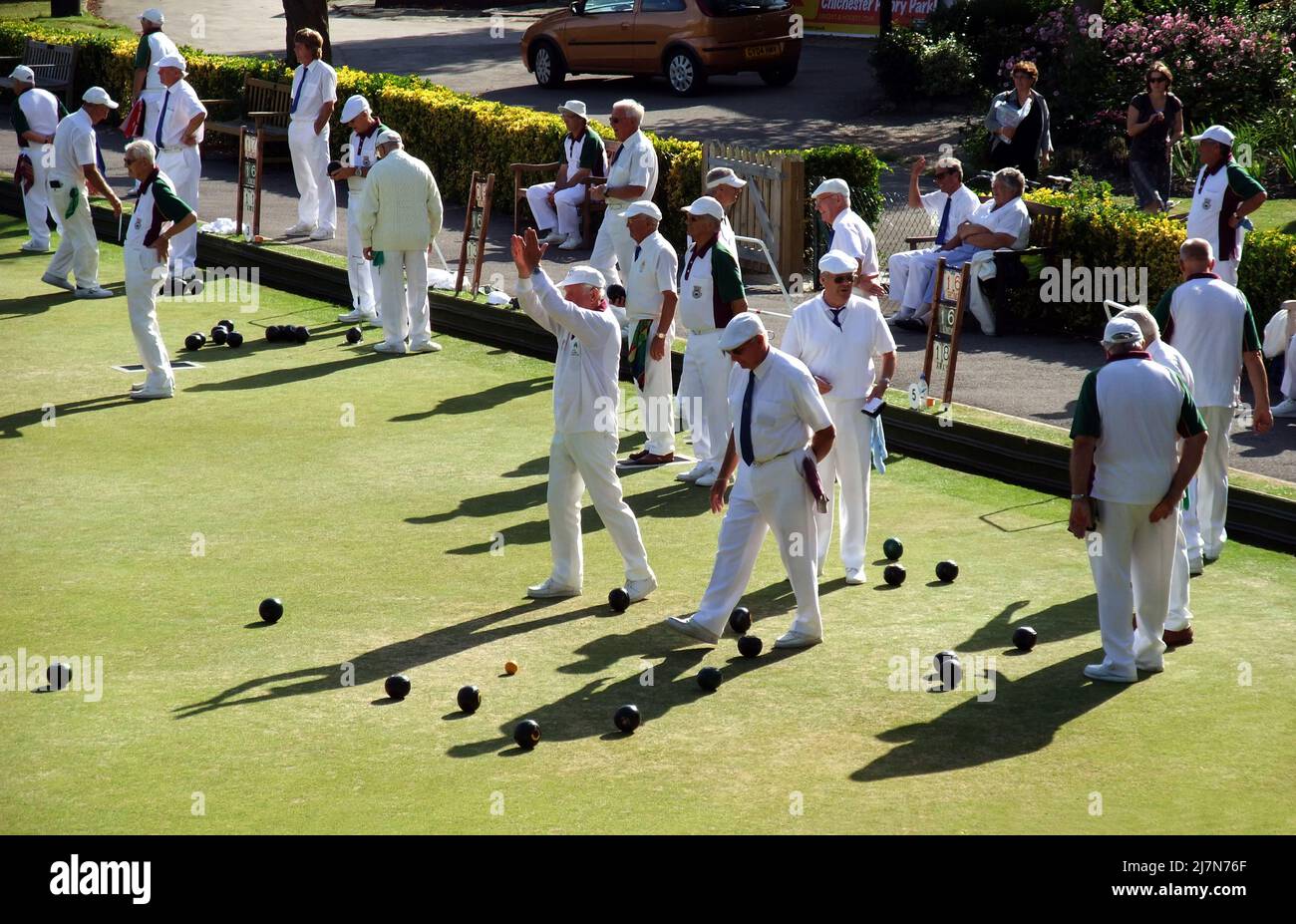 men playing bowls on the green, Chichester, West Sussex, England Stock Photo