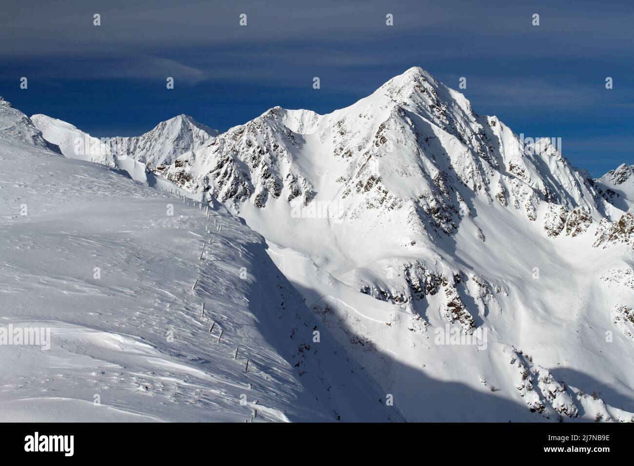 Mountains in intalian alps with small avalanche Stock Photo