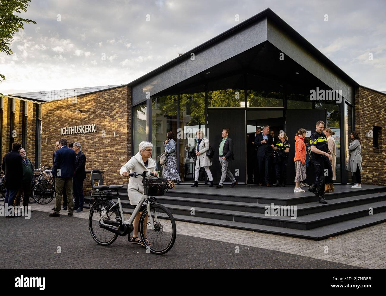 2022-05-10 20:41:57 ALBLASSERDAM - Visitors leave the Ichtuskerk after a prayer service for the victims of the shooting drama at the Tro Tardi care farm in which a 16-year-old girl from Dordrecht and a 34-year-old woman from Alblasserdam were killed. During the service, there is also a reflection on a scooter accident in Alblasserdam, on the same day as the shooting drama, in which two women died after being hit by a car. ANP SEM VAN DER WAL netherlands out - belgium out Stock Photo