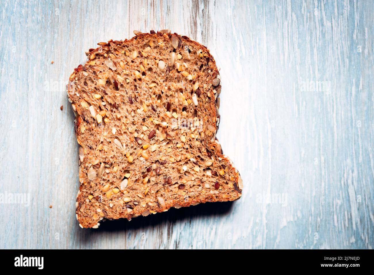 Directly above shot of a slice of wholegrain, soya and Linseed bread Stock Photo