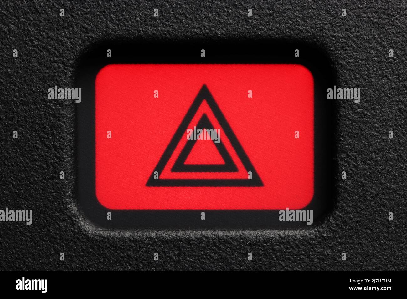 Warning Light Red Button. Car Dashboard Element on Black