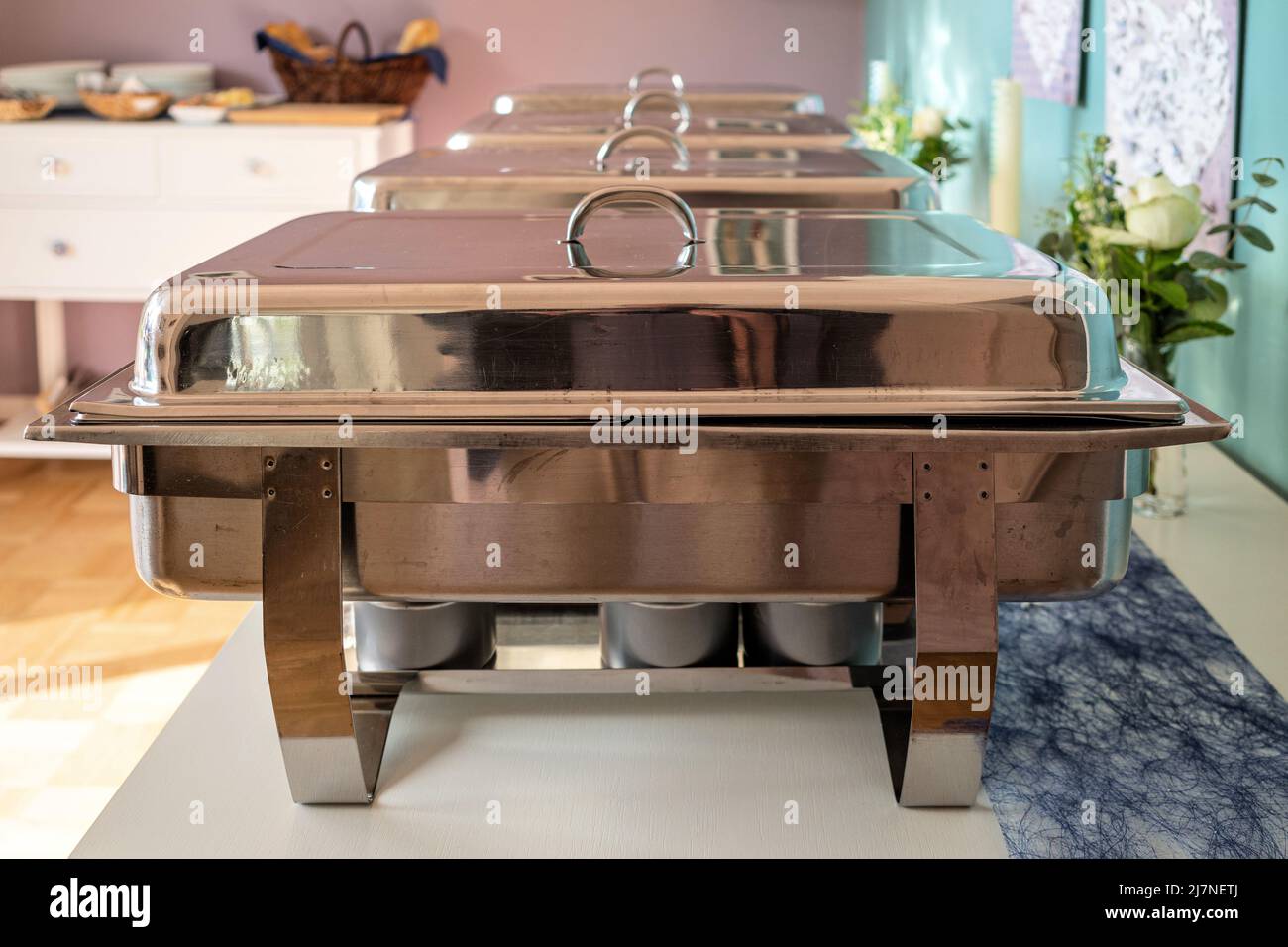 chafing dishes on buffet table Stock Photo Alamy
