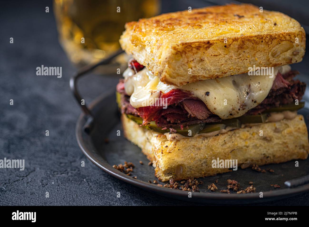 Ruben sandwich. New York sandwich with pastrami. Front view. Fast food