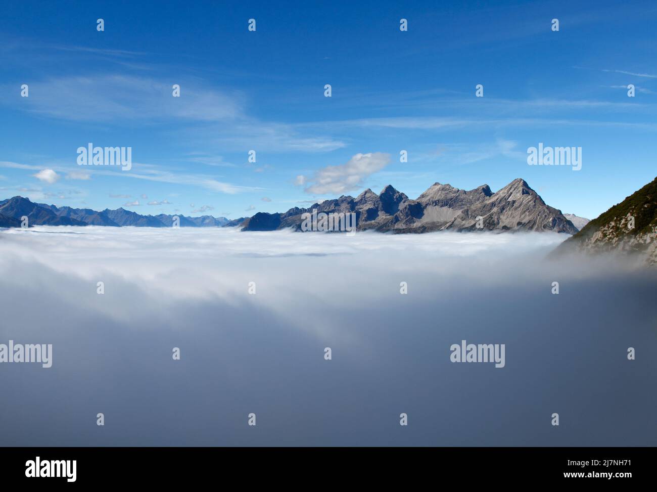 Above the clouds. View to the Lechtaler Alps. Stock Photo