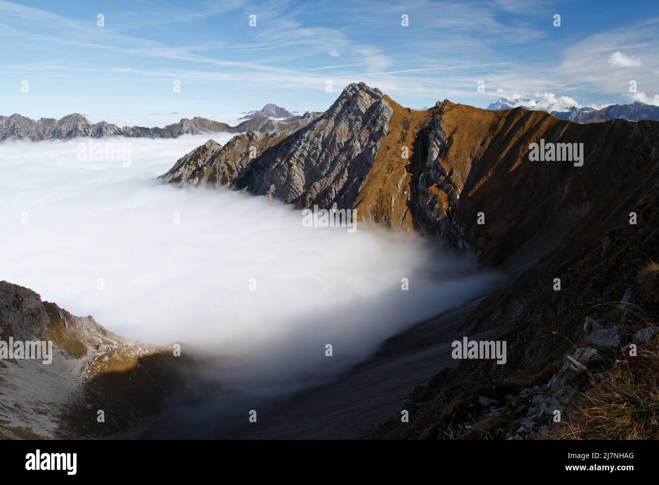 Above the clouds. View to the Lechtaler Alps. Stock Photo