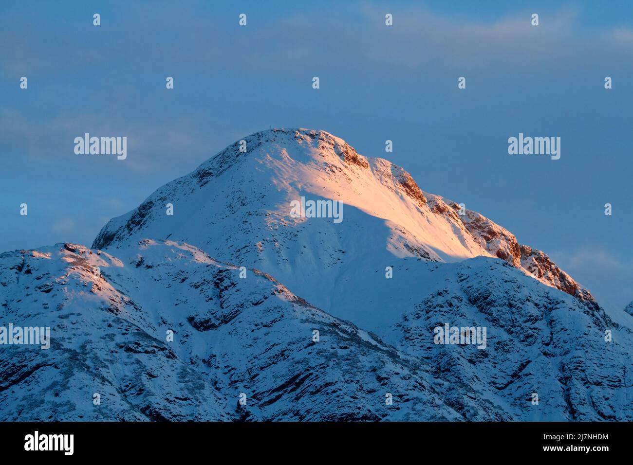 Fantastic evening winter landscape with a colorful snowy mountain peak in Austria Stock Photo