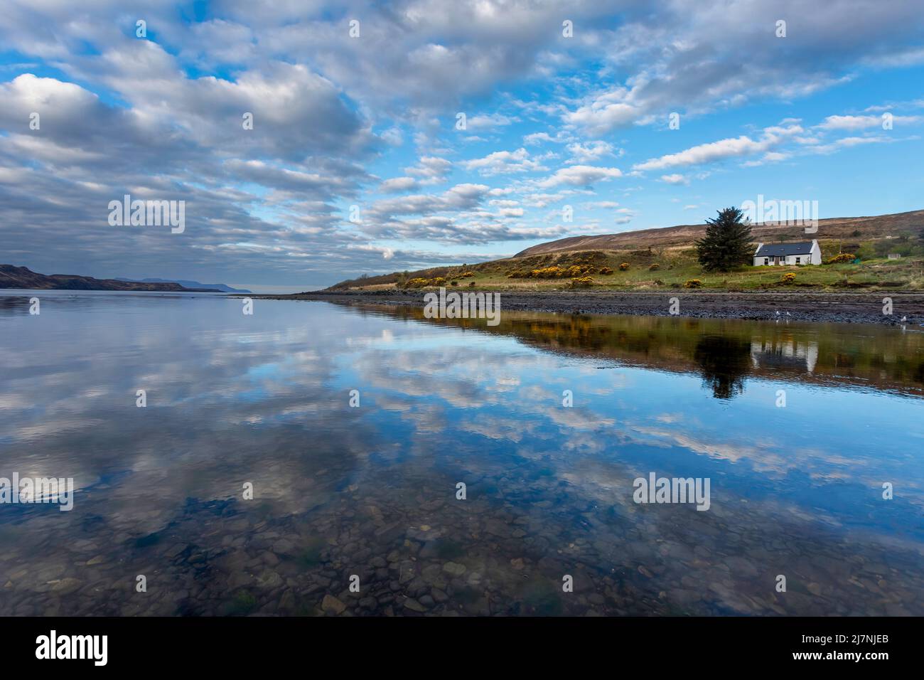 Editorial Scotland, UK - April 27, 2022: Dawn on the River Brittle as it flows into Loch Brittle on the Isle of Skye, Scotland, UK Stock Photo