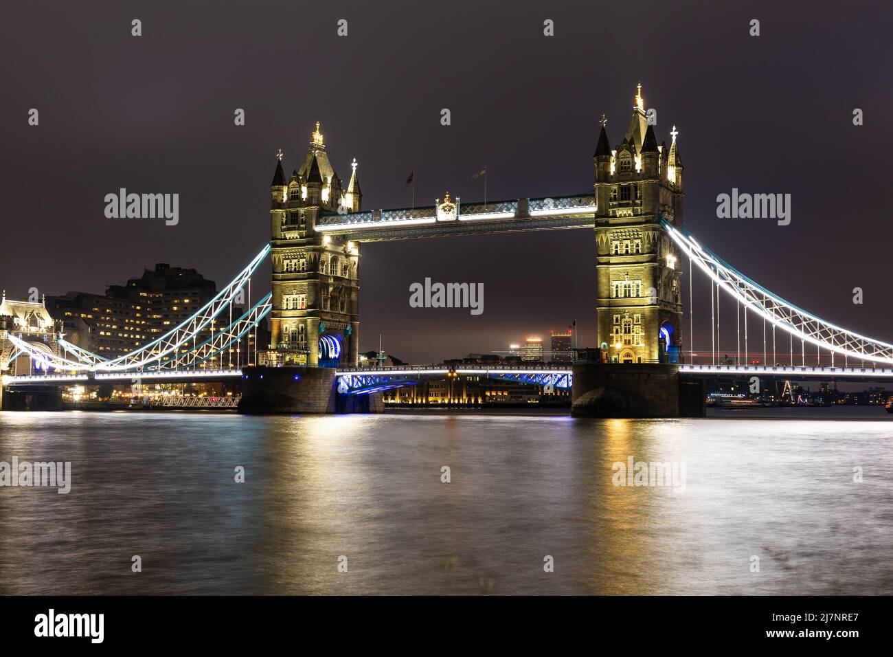 Iconic Tower bridge, London, at night with the lights on