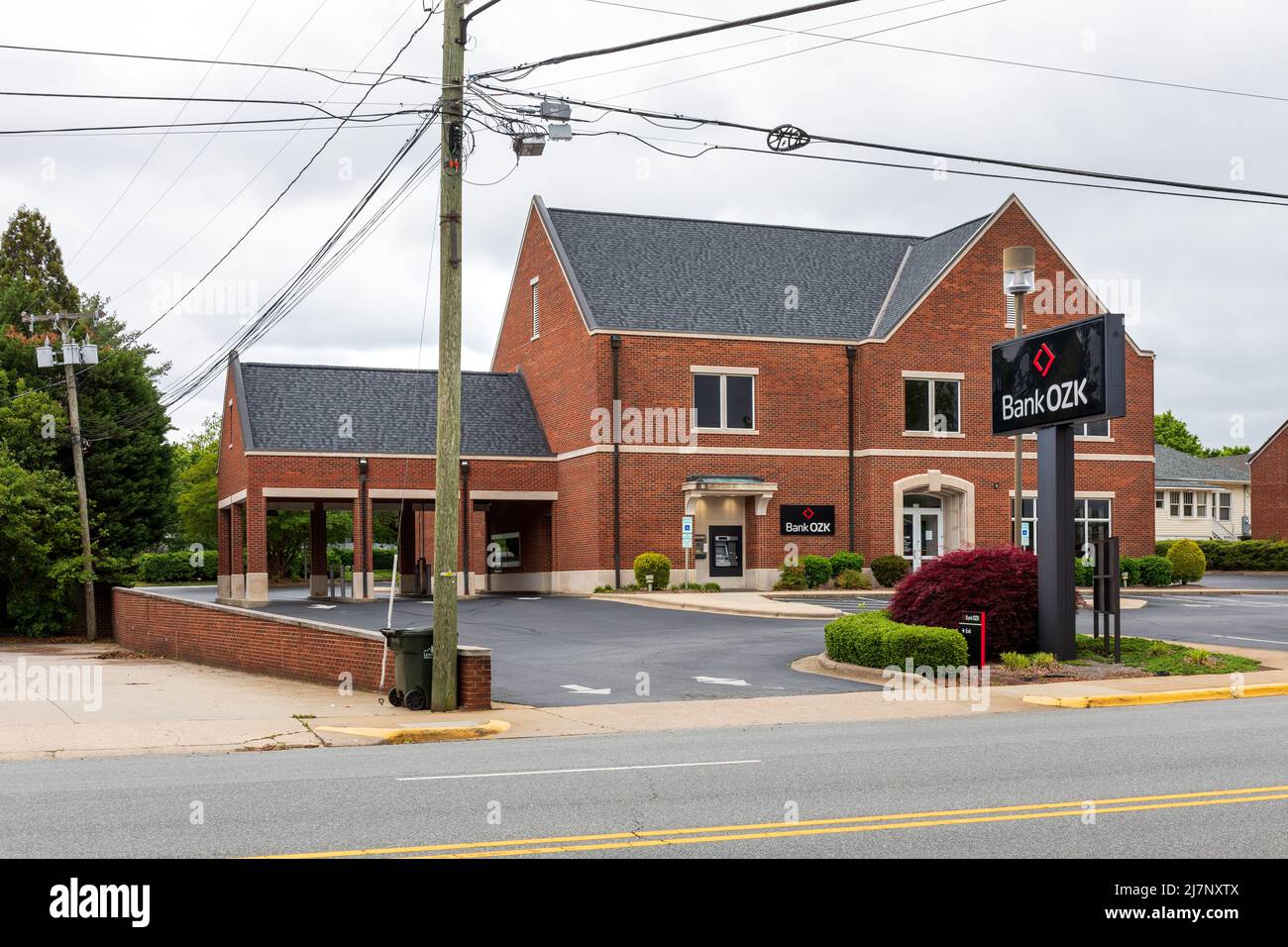 LEXINGTON, NC, USA-8 MAY 2022: Bank OZK building, showing signs, ATM and drive thru. Stock Photo