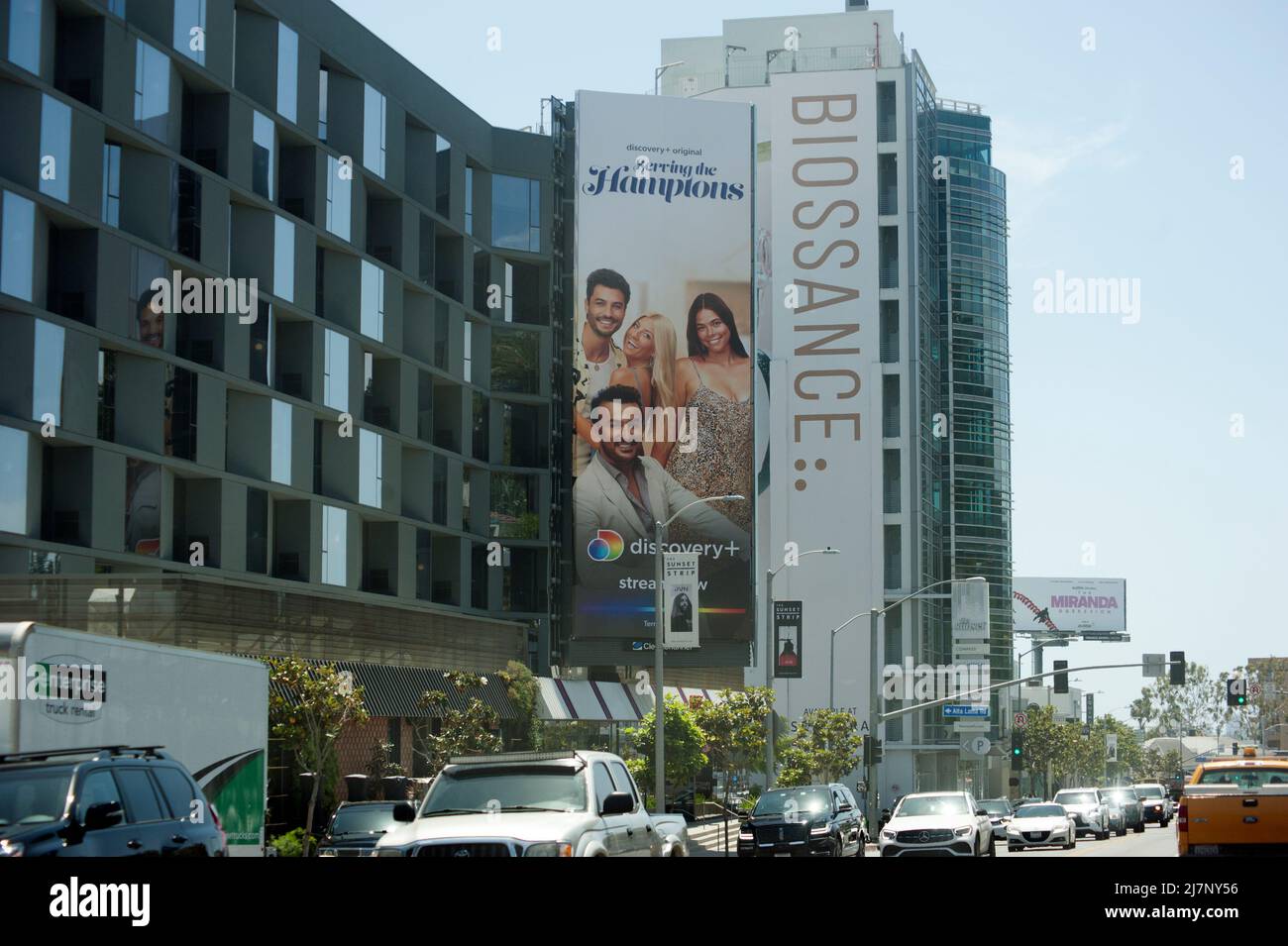 Large vertical billboard is part of architecture in new buildings on the Sunset Strip in Los Angeles, CA. Stock Photo