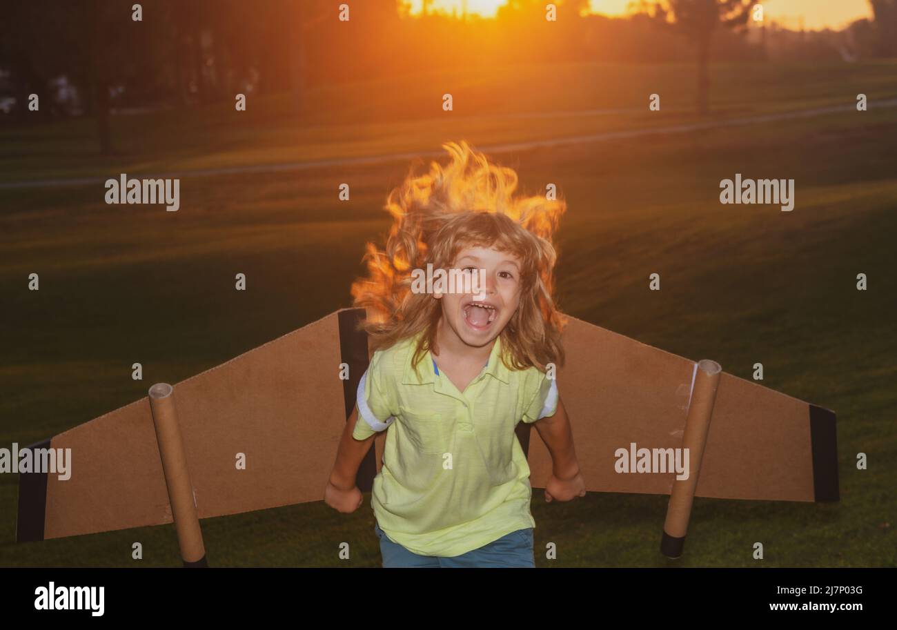 Excited child dreams of a rocket pilot. Imagination and