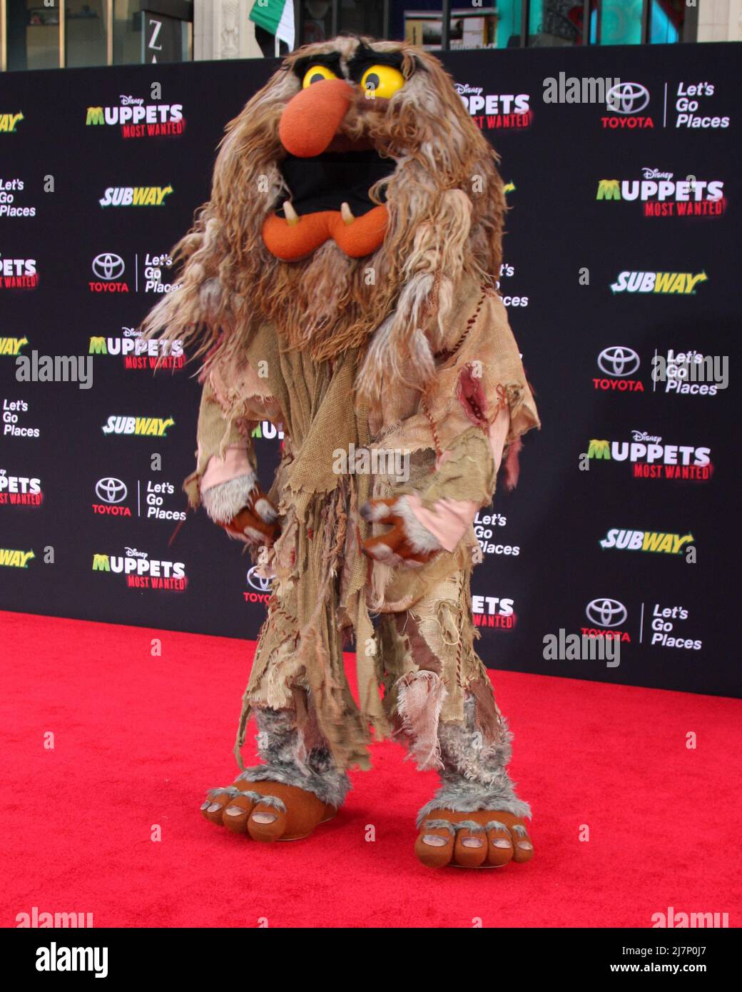 LOS ANGELES - MAR 11:  Sweetums at the 'Muppets Most Wanted' - Los Angeles Premiere at the El Capitan Theater on March 11, 2014 in Los Angeles, CA Stock Photo