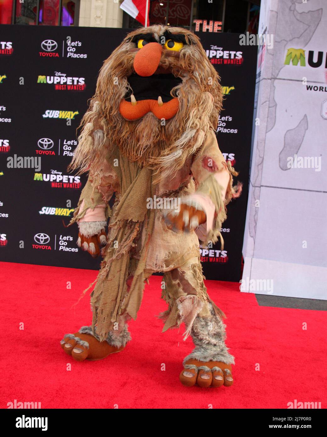 LOS ANGELES - MAR 11:  Sweetums at the 'Muppets Most Wanted' - Los Angeles Premiere at the El Capitan Theater on March 11, 2014 in Los Angeles, CA Stock Photo