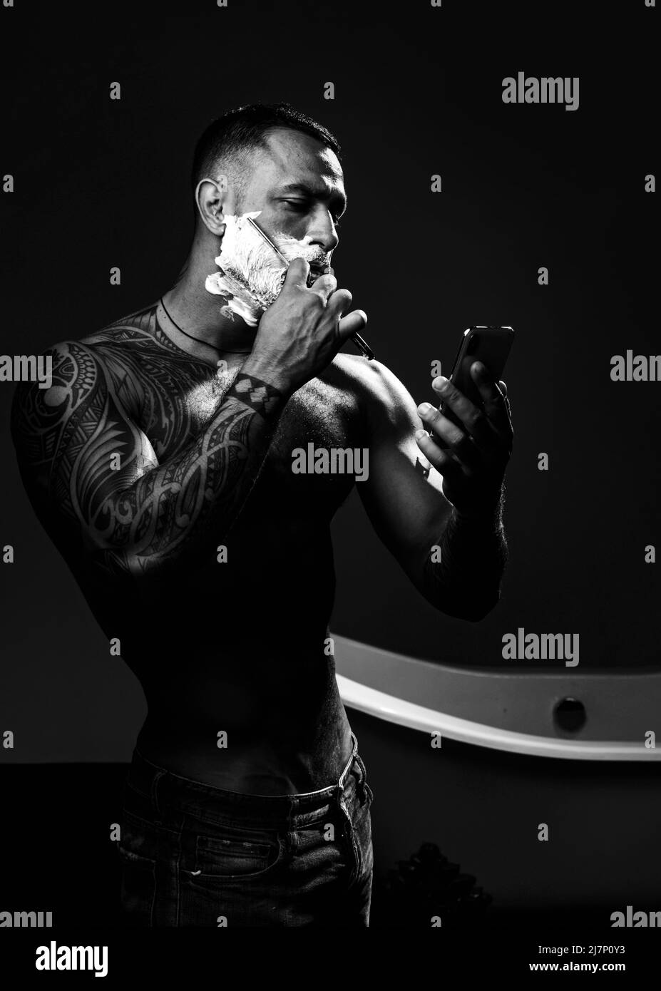 Razor blade. Bearded man. Barber Shop Studios. Moustache Wax. Making haircut look