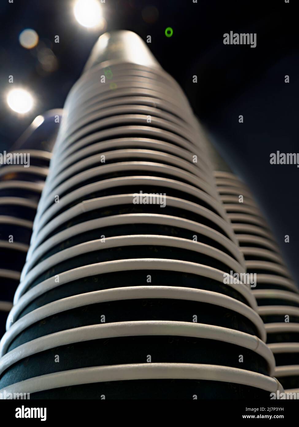 Stacks of the dark disposable paper cups, background Stock Photo