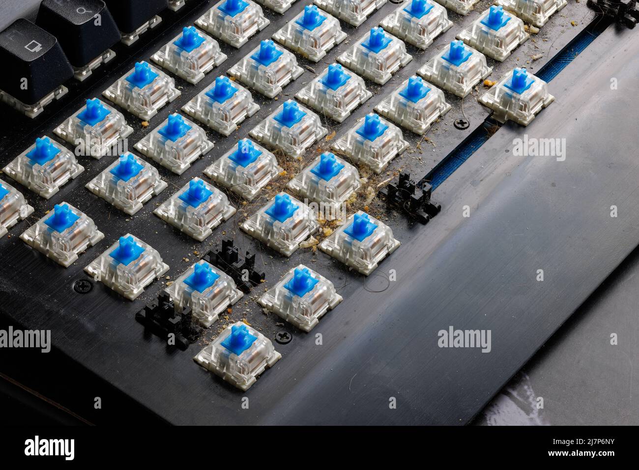 dirty mechanical keyboard without keycaps before cleaning Stock Photo