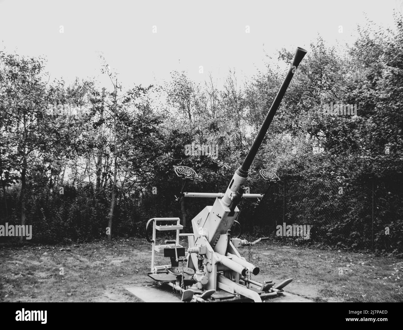 Black and white photo of a WWII anti-aircraft gun, station along the Atlantic Wall in Belgium, Atlantikwall Raversyde. Stock Photo
