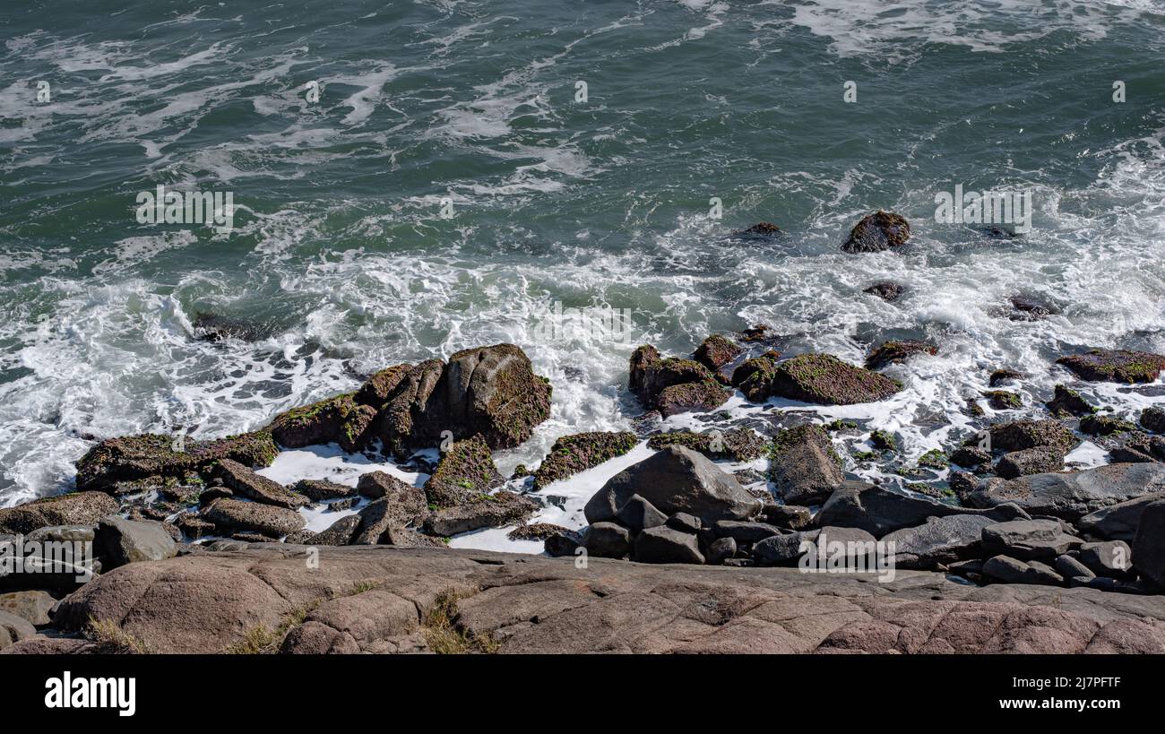 view of ocean waves hitting rocks Stock Photo Alamy