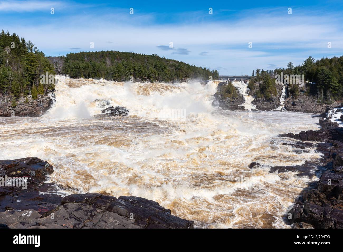 The St Maurice river at the Shawinigan devil’s hole during the spring floods, Quebec, Canada Stock Photo