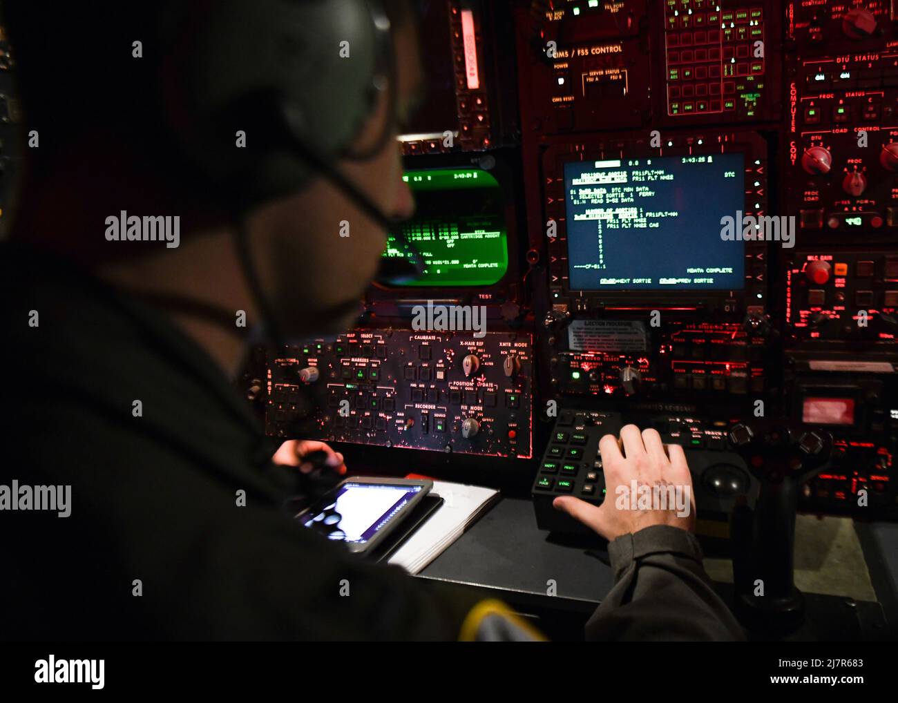 69th Bomb Squadron B-52H Stratofortress Radar Navigator Capt. Brett 'Ohm' Niemantsverdriet conducts B-52H pre-flight procedures on May 2, 2022, at Minot Air Force Base, North Dakota. The B-52H can carry and employ a large array of weapons, including gravity bombs, cluster bombs, precision-guided missiles, and joint direct attack munitions. (U.S. Air Force photo by Senior Airman Michael A. Richmond) Stock Photo