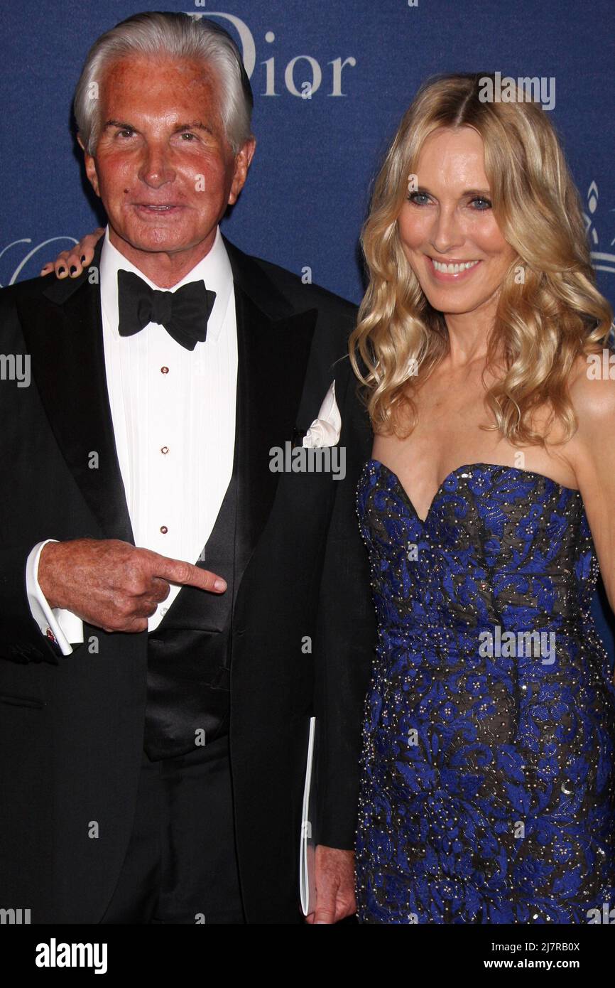 LOS ANGELES - OCT 8:  George Hamilton, Alana Stewart at the Princess Grace Foundation Gala 2014 at Beverly Wilshire Hotel on October 8, 2014 in Beverly Hills, CA Stock Photo