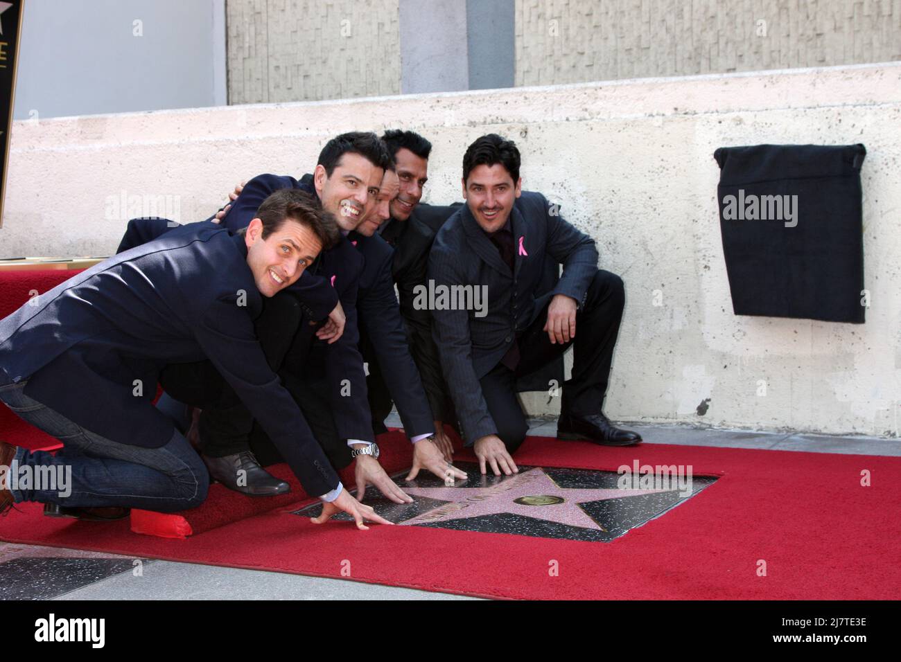 LOS ANGELES - OCT 9:  New Kids On The Block, Jordan Knight, Donnie Wahlberg, Joe McIntyre, Danny Wood, Jonathan Knight at the New Kids On the Block Hollywood Walk of Fame Star Ceremony at Hollywood Boulevard on October 9, 2014 in Los Angeles, CA Stock Photo
