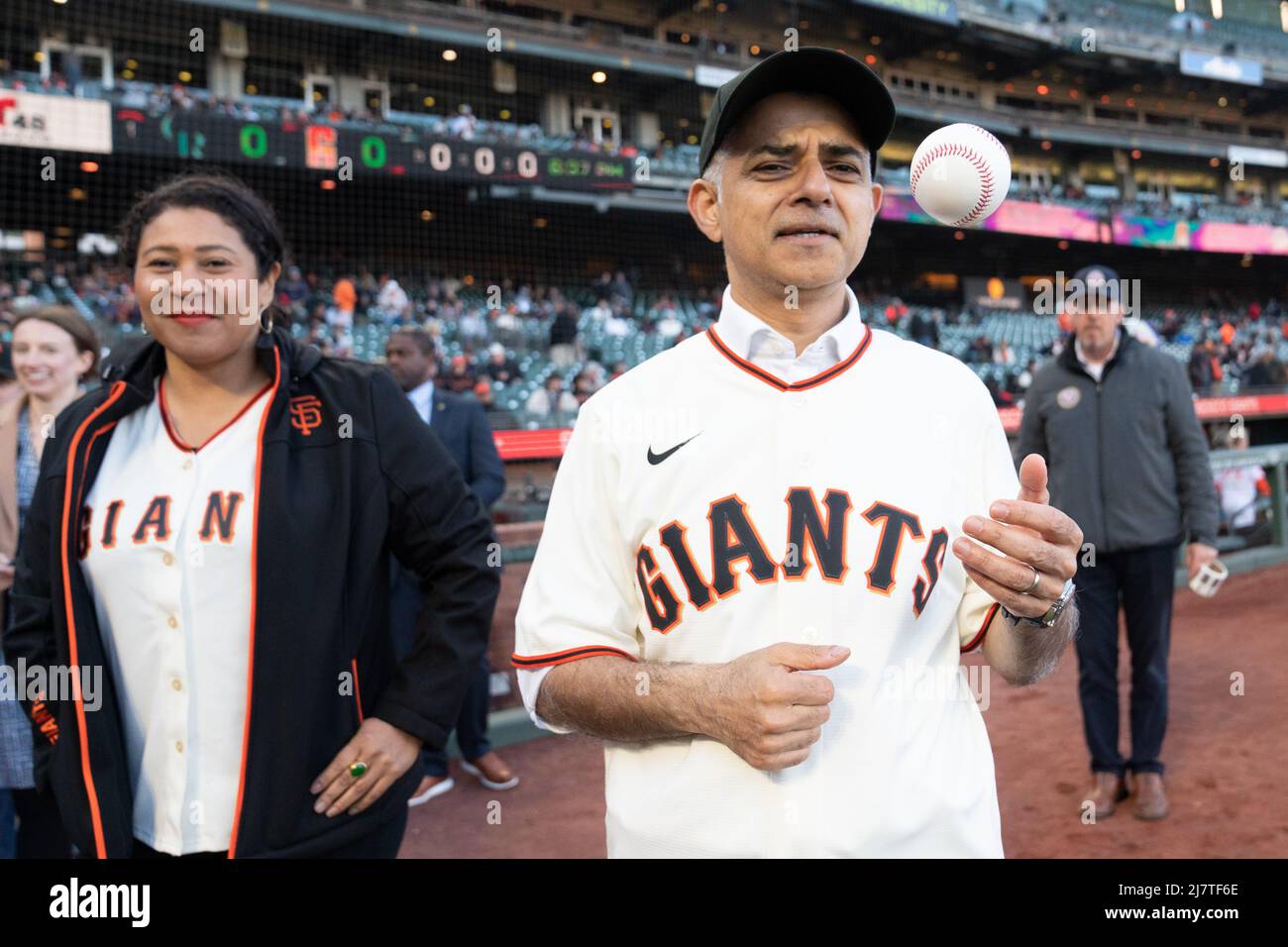 Mayor of London Sadiq Khan at the San Francisco Giants v Colorado Rockies baseball game at Oracle Park with the Mayor of San Francisco, London Breed (left), before pitching the first ball to start the game, during his 5 day visit to the US in a bid to boost London's tourism industry. Picture date: Tuesday May 10, 2022. Stock Photo